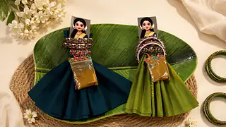 return gift doll pasupu kumkum